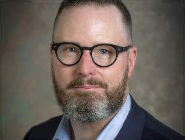 Headshot of Dr. William Lewis