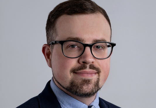 Headshot of Dr. John Strong